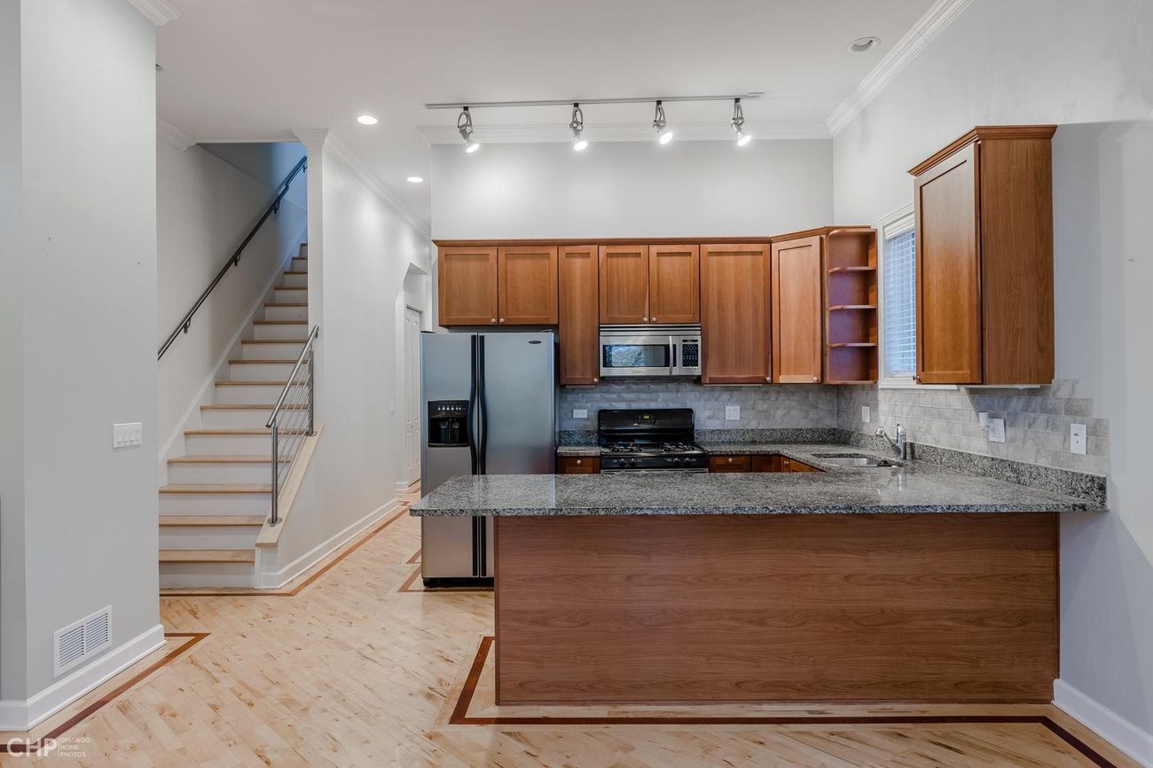 Logan Square 2BD — kitchen, wide view