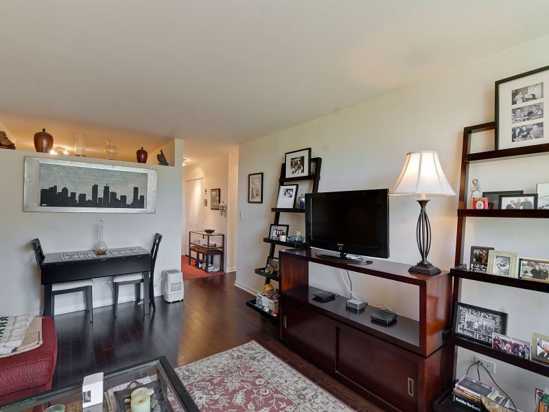 Sheridan Tower Condo — dining and living area, wide view