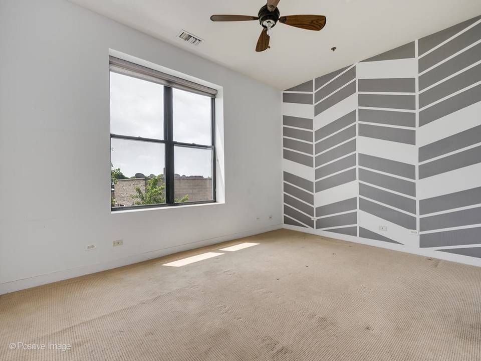 The South Leavitt — bedroom with chevron accent wall