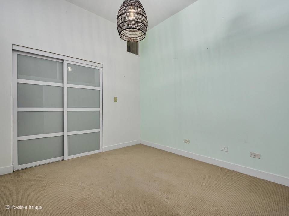 The South Leavitt — bedroom with sliding glass closet doors