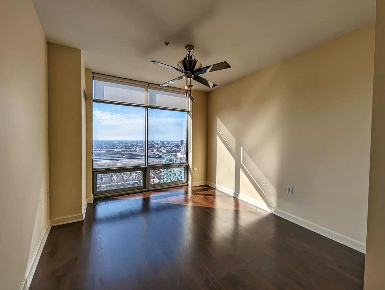 South Loop Penthouse — bedroom with city views