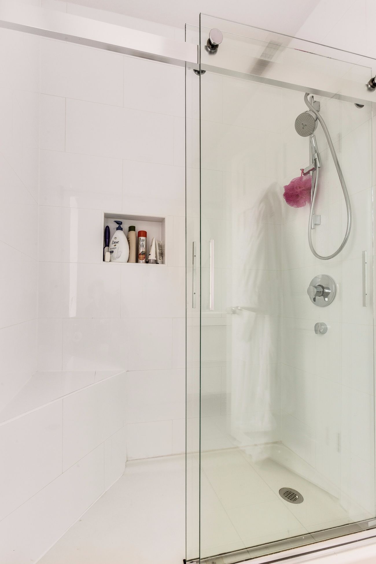 Troy St — glass-enclosed shower with bench