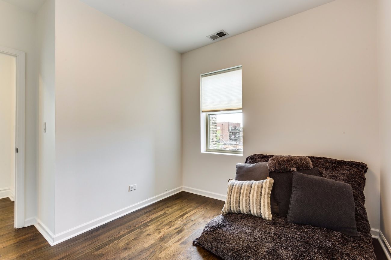 Troy St — second bedroom with corner window