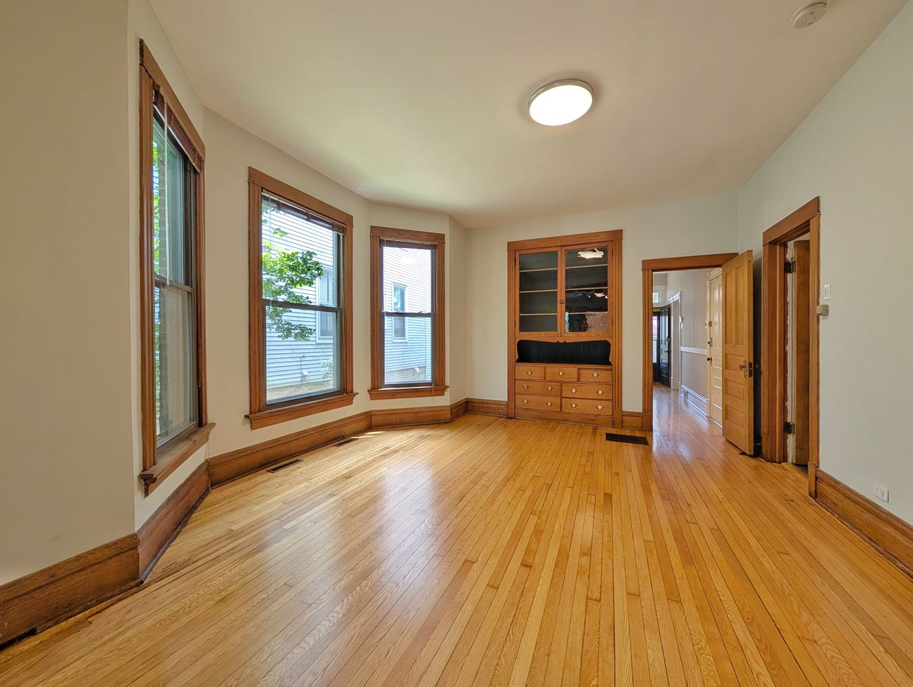 Wellington 3 Flat — dining room with built-in hutch