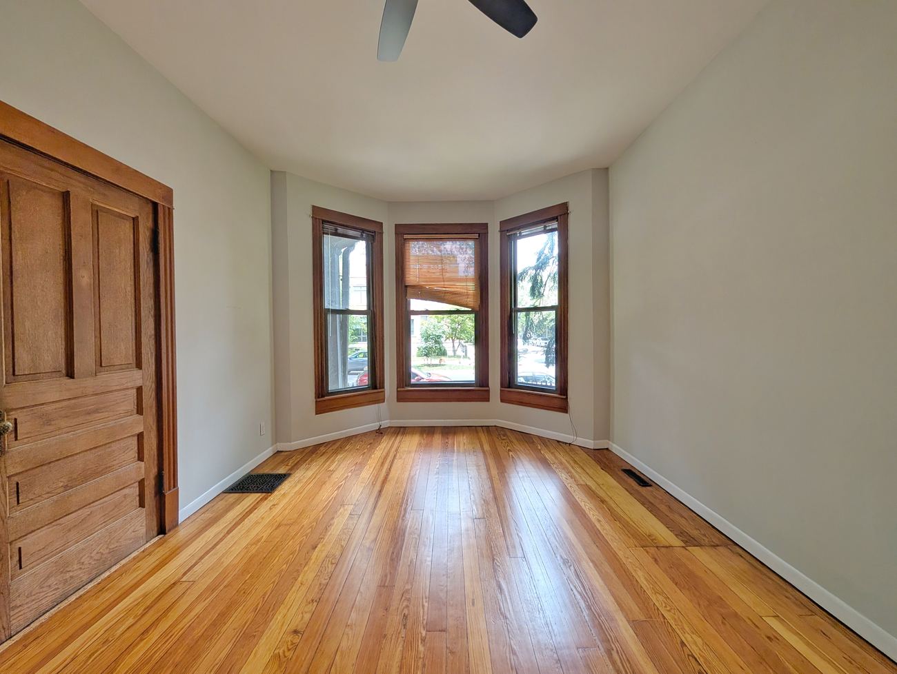Wellington 3 Flat — unit room with original hardwood floors