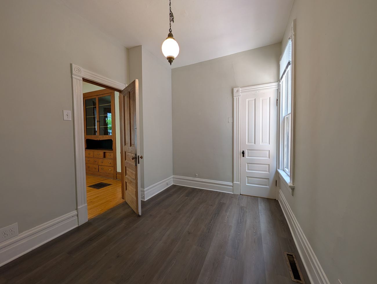 Wellington 3 Flat — renovated unit room with built-in hutch visible