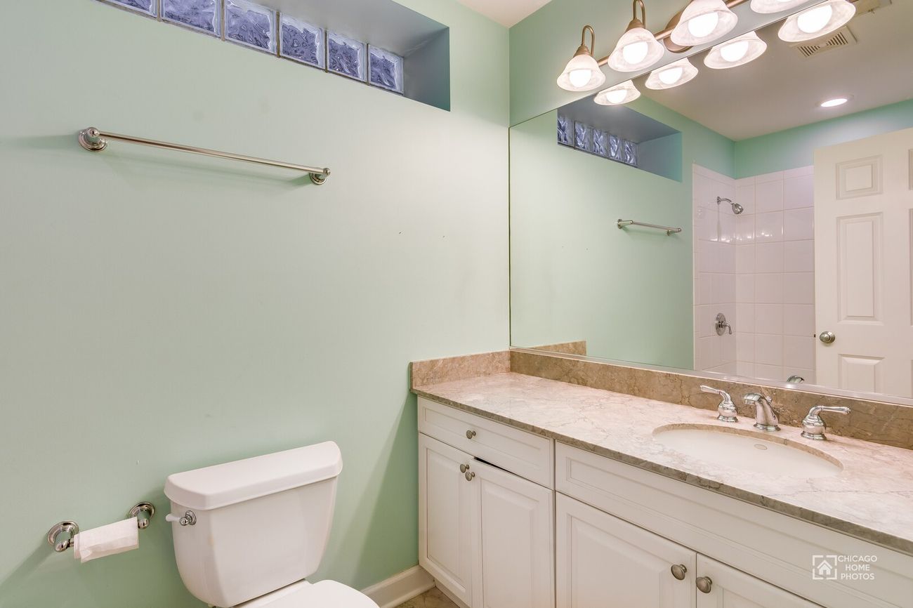 West Lakeview Duplex — lower-level bathroom