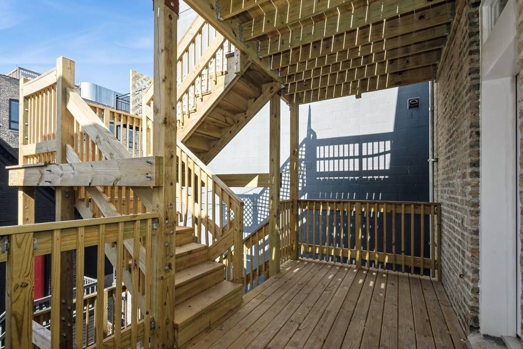 Wicker Park 3 Flat — rear deck and stairs, alternate view