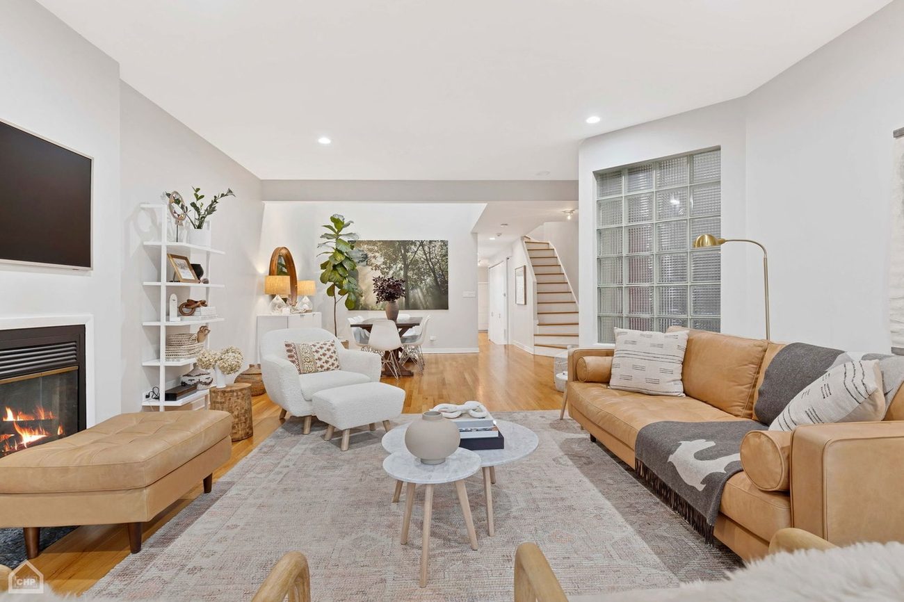 Wicker Park Gem — living room with fireplace and leather sofa