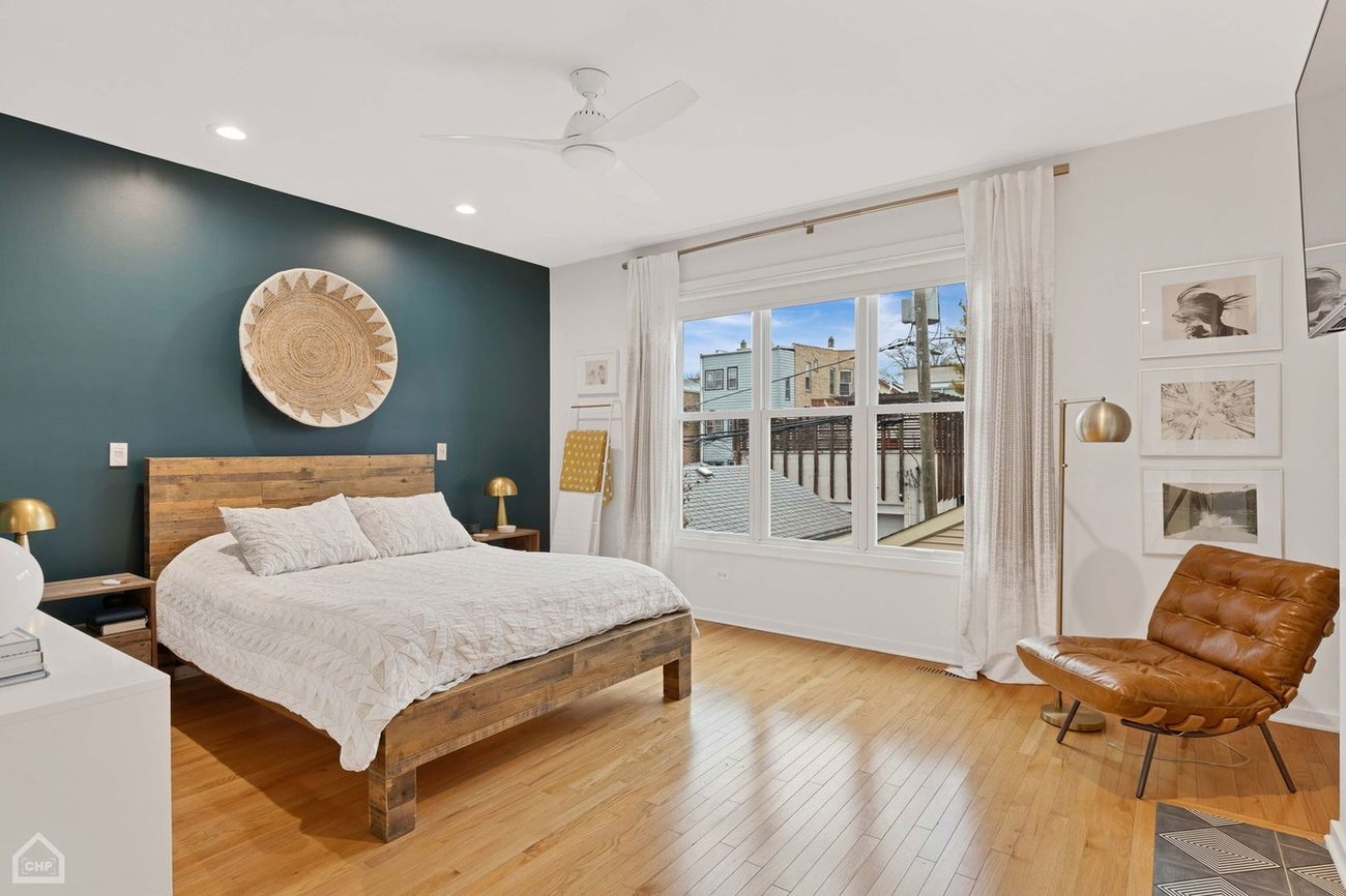 Wicker Park Gem — primary bedroom with teal accent wall